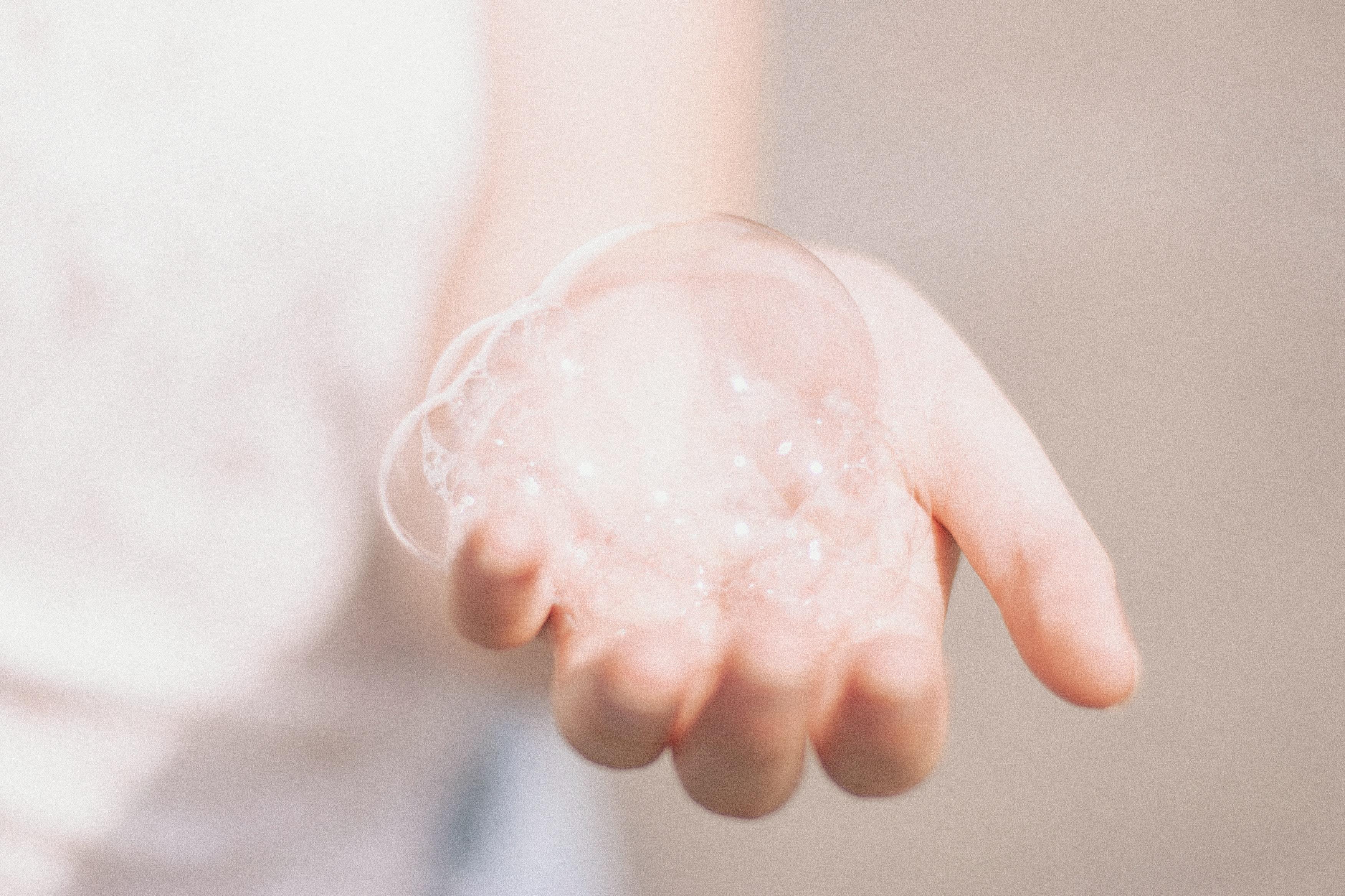 clean soap bubbles on washed hand