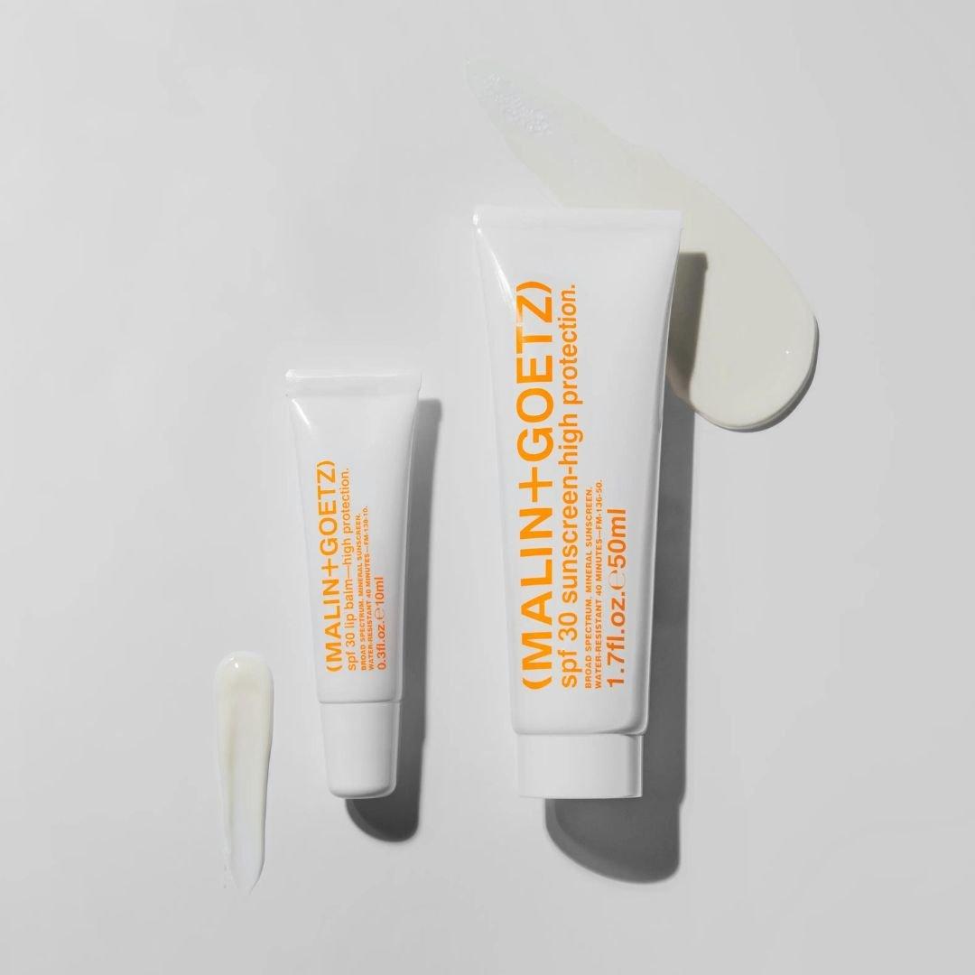 Malin + Goetz - high protection lip balm | Perfume Lounge