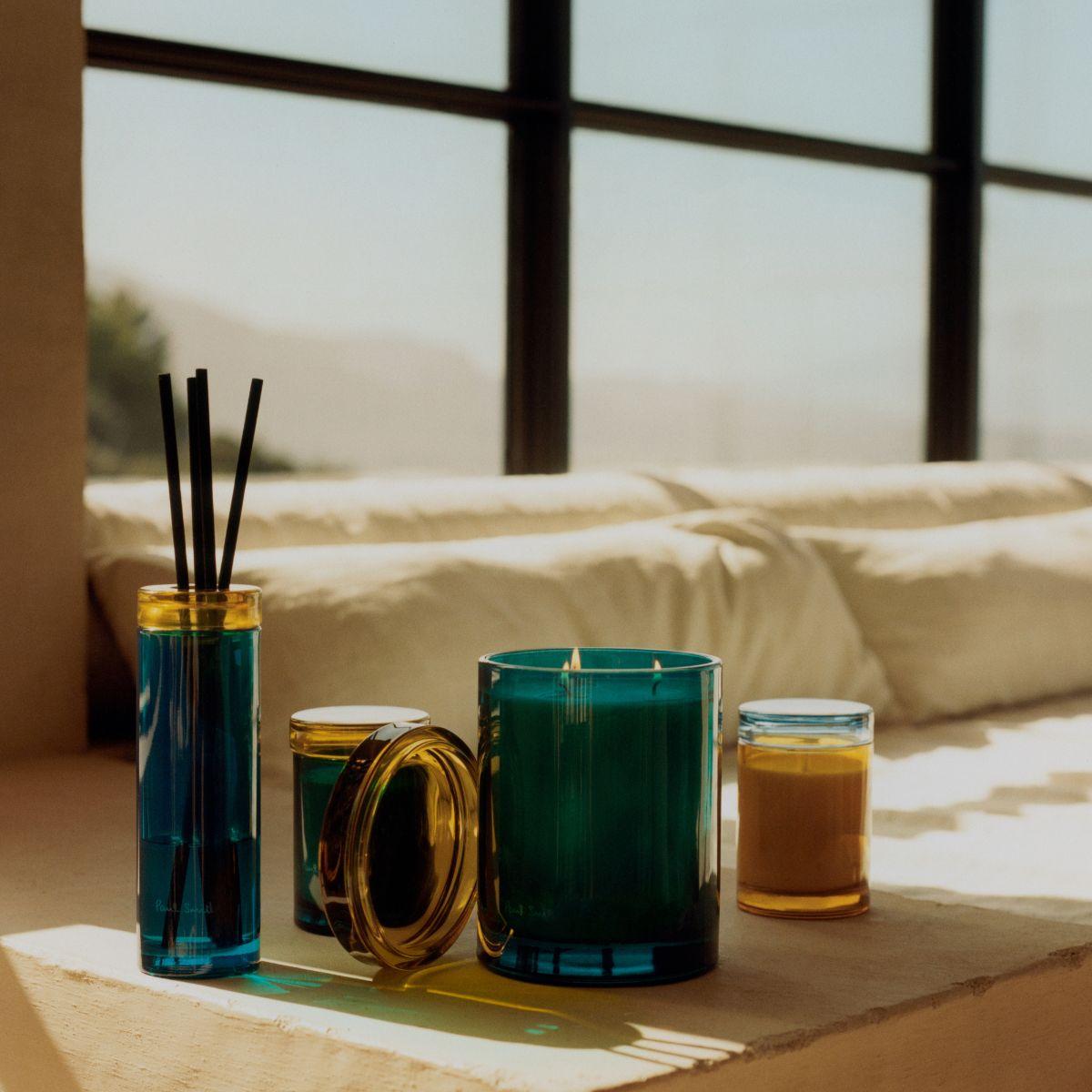 Image of Sunseeker scented candle and reed diffuser by Paul Smith